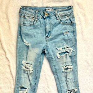 Light Blue Ripped Flare Jeans BARLEY WORN Size US 4
Great Condition